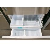 The freezer has two drawers for storing food and a factory-installed automatic icemaker.